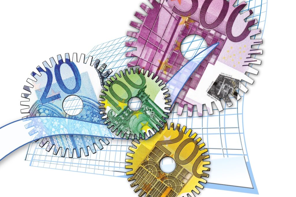 Eurosedlar i ett tre kugghjul